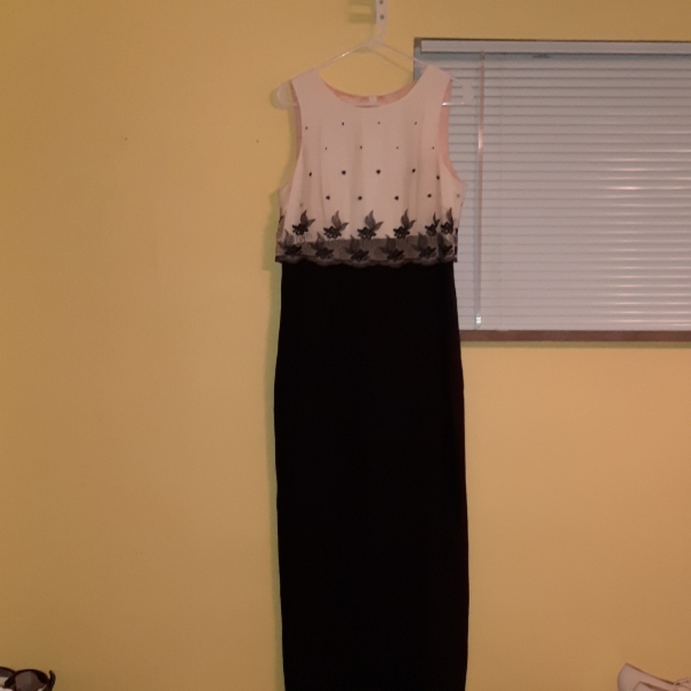 Long black/ white dress. Slit up the back